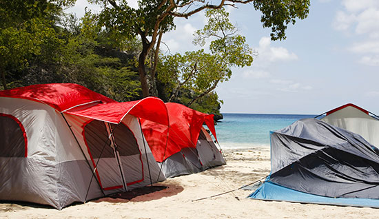 How to stake out tents on a sandy beach