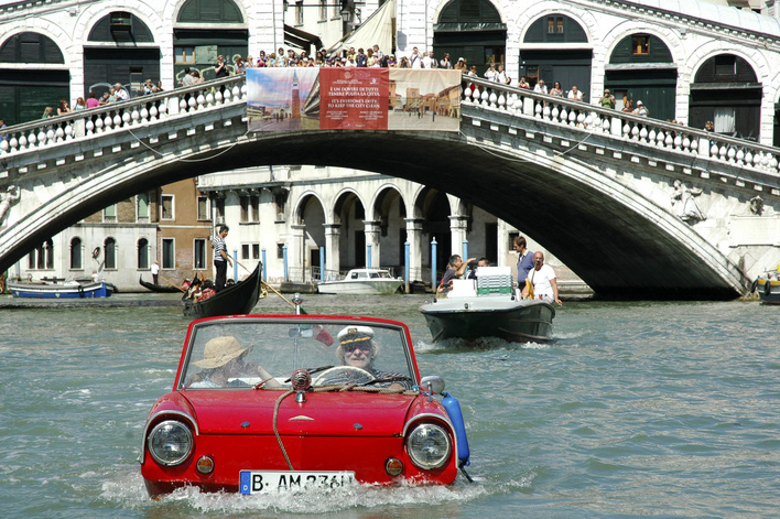 Weise pilots his 1961 Amphicar down the Grand Canal in Venice