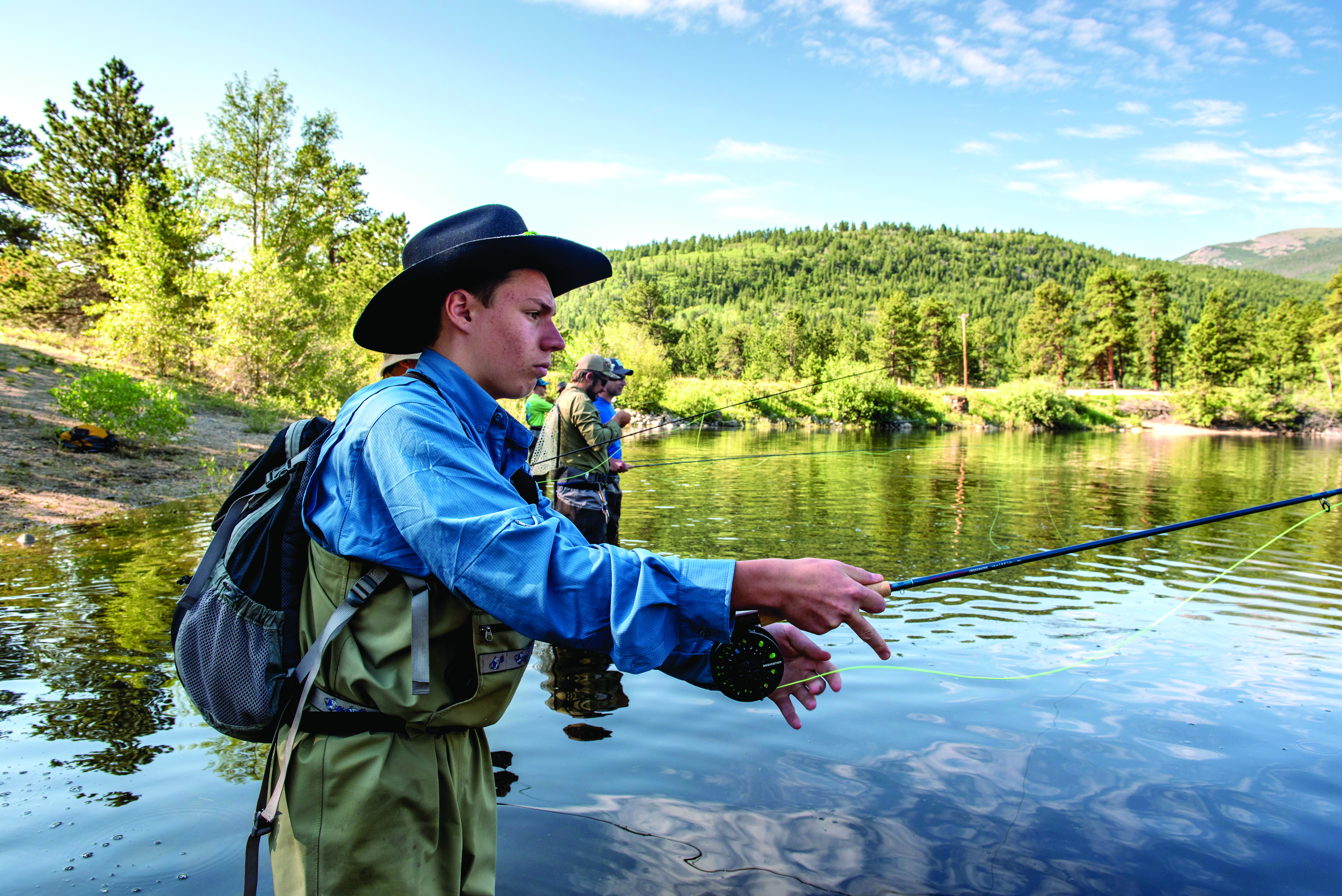 Scouts learn and practice fly fishing skills in Rocky Mountain National Park, Colorado