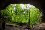 Scouts pass under Carter Cave’s Natural Bridge on their way to Bat Cave.