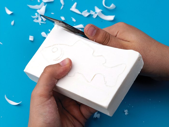 soap carvings of boy and girl