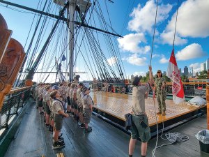 Scouts raise the flat on the USS Constitution