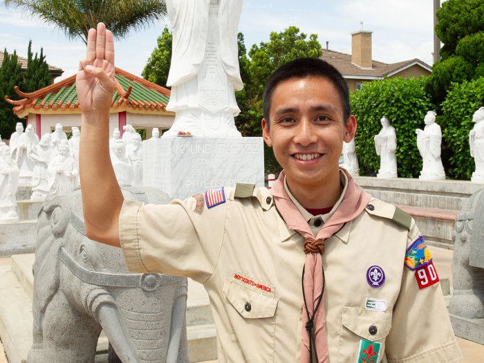 Scout demonstrating the Scout sign