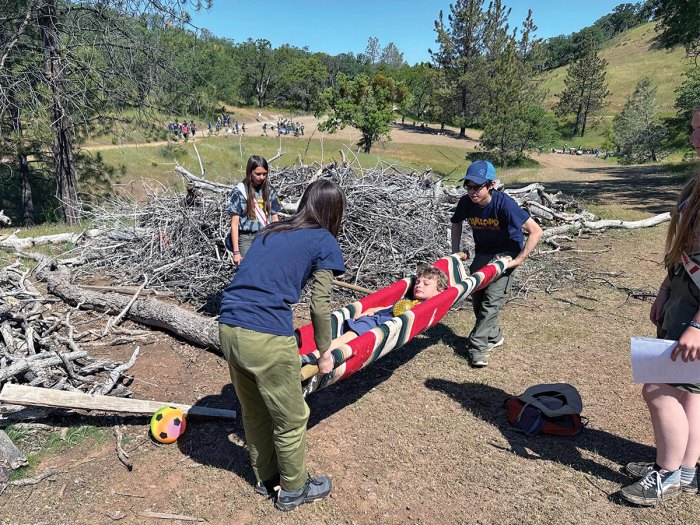 Scouts making a stretcher