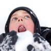 Boy eating snow