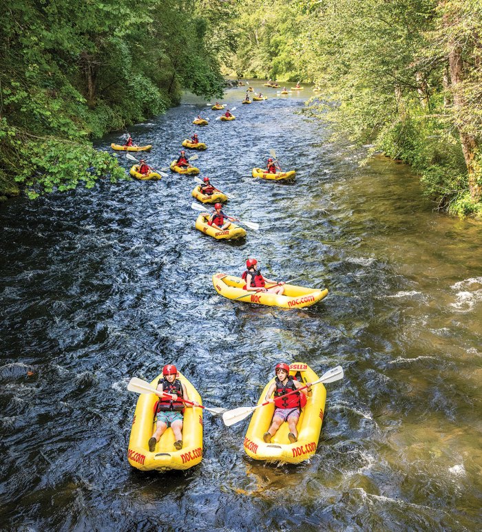 Scouts BSA troop kayaking on the river