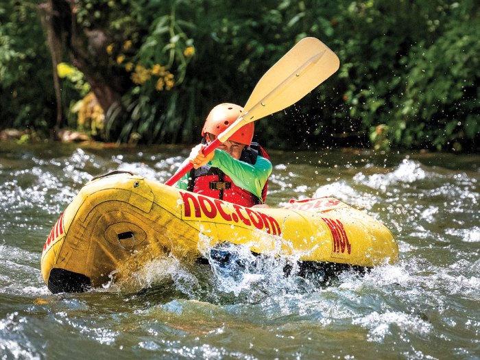 Scout paddles the Nantahala River