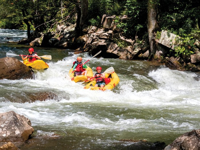 Three Scouts ride the rapids