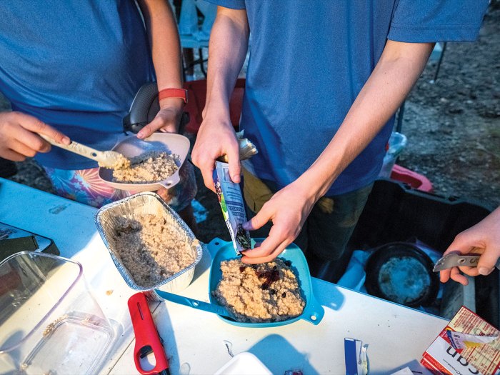 Scouts make a camp meal