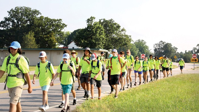 Scouts hiking along roads in North Carolina