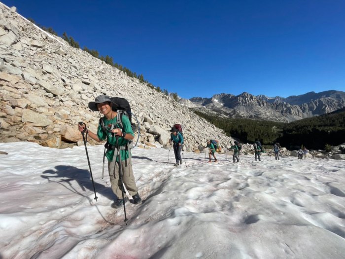 Scouts climbing a snow field in the Sierra Nevadas