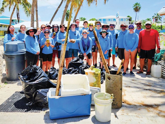 Scouts posing after cleaning up a beach