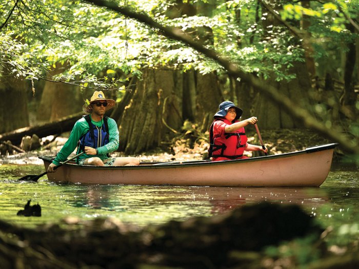 Two Scouts canoeing