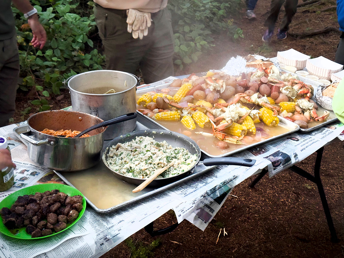 Table full of food from a seafood boil