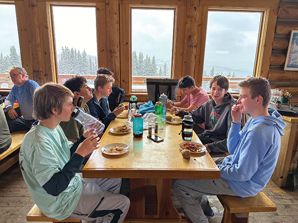 Eating breakfast in the mountain hut