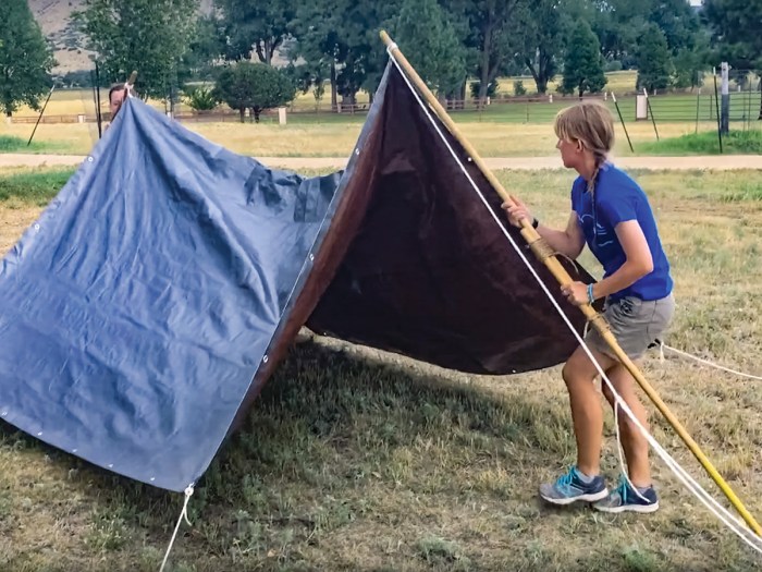 Scouts setting up a dining fly