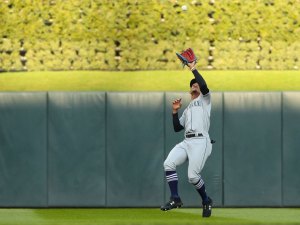 Julio Rodriguez catching a ball