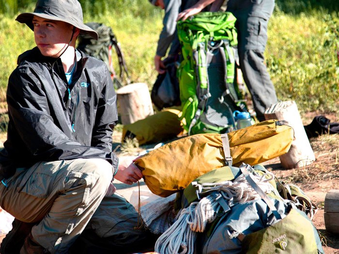 Scouts go through the gear they'll need during a shakedown hike