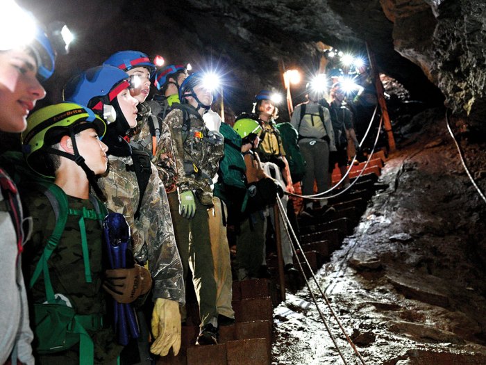 Scouts looking at cave features