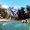 Troop 260 of San Jose, California, floats down the Salmon River flanked by rugged peaks