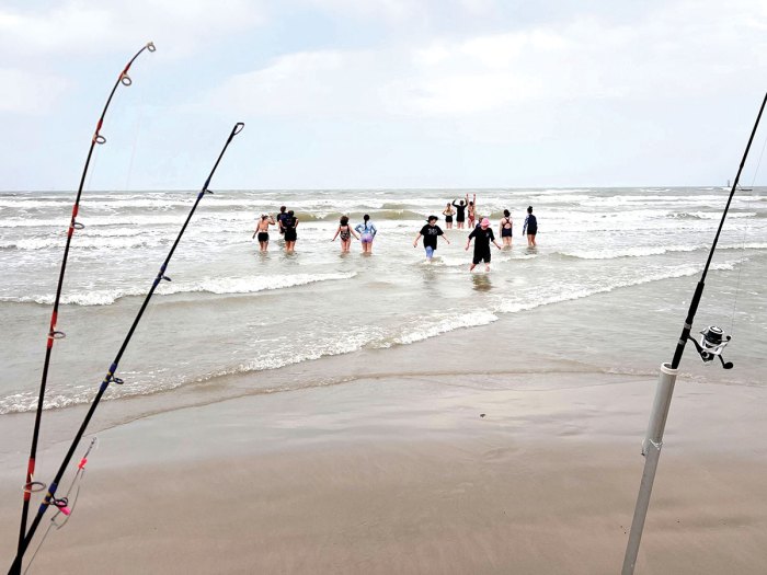 Scouts enjoy the waves at Mustang State Park in Texas
